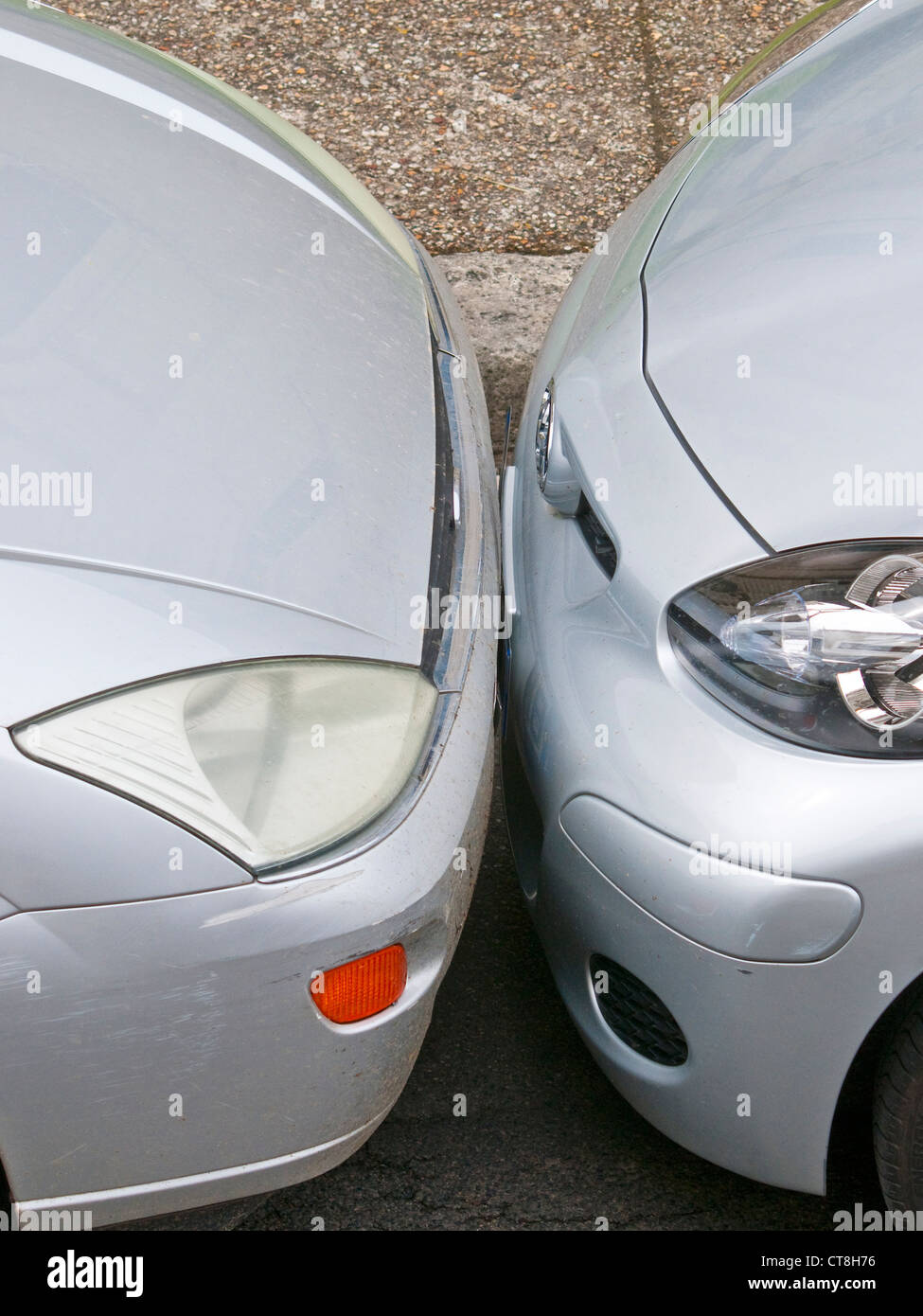 Two cars badly parked bumper to bumper France Stock Photo Alamy