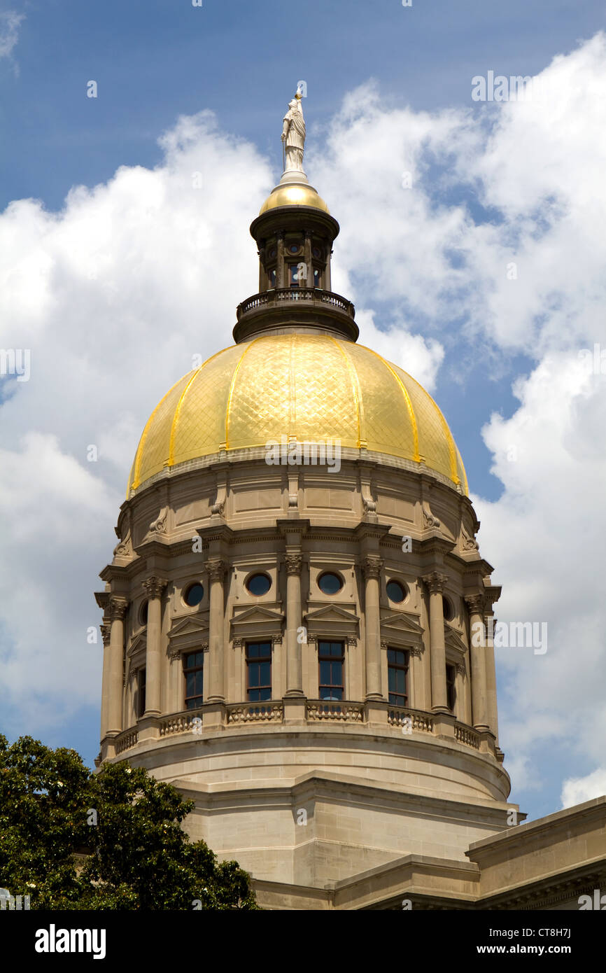 Golden globe of Georgia capitol dome in Atlanta, Georgia, USA against a cloudy blue sky. Stock Photo