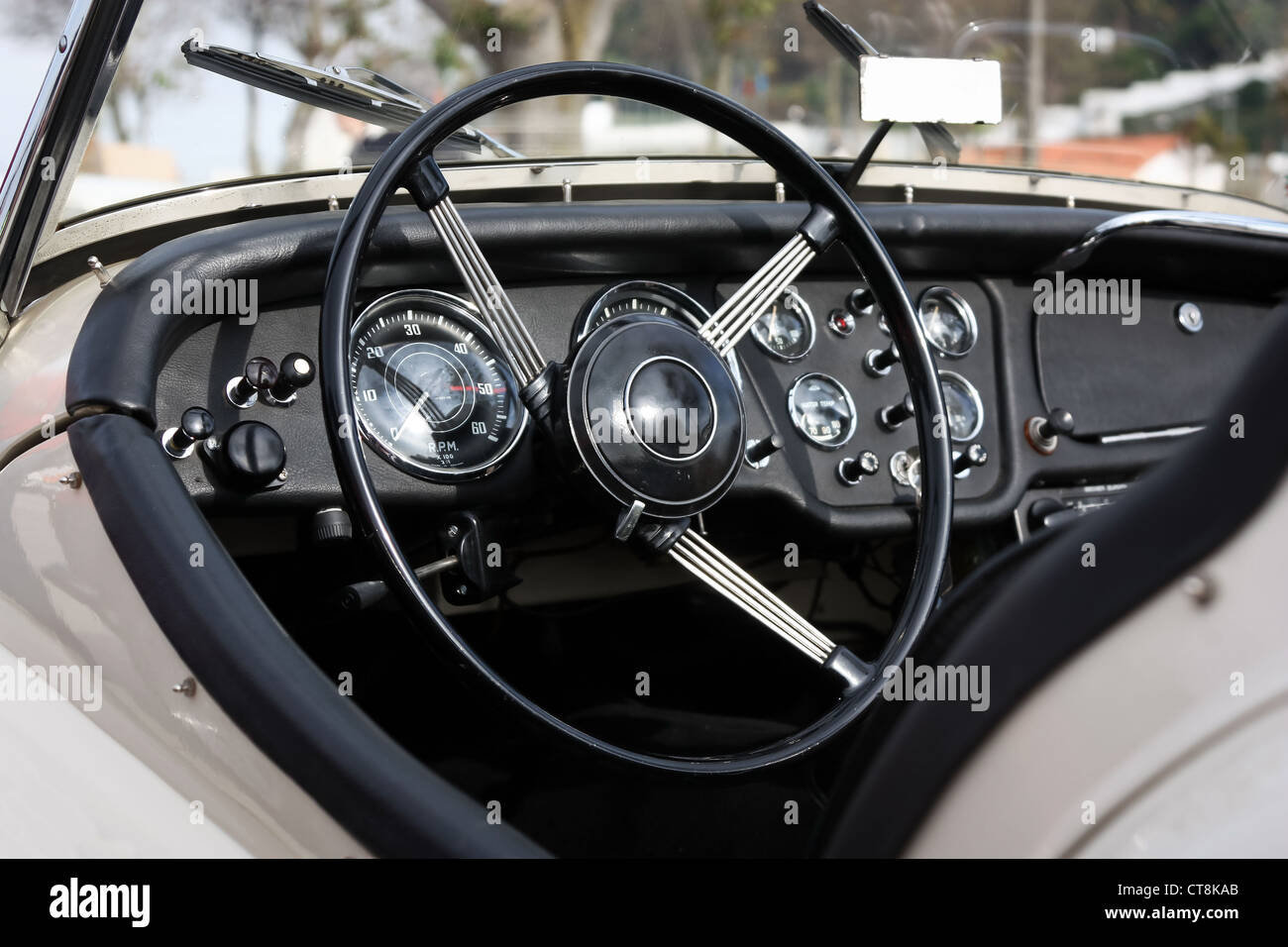 retro styled classic car dashboard under sunlight Stock Photo Alamy