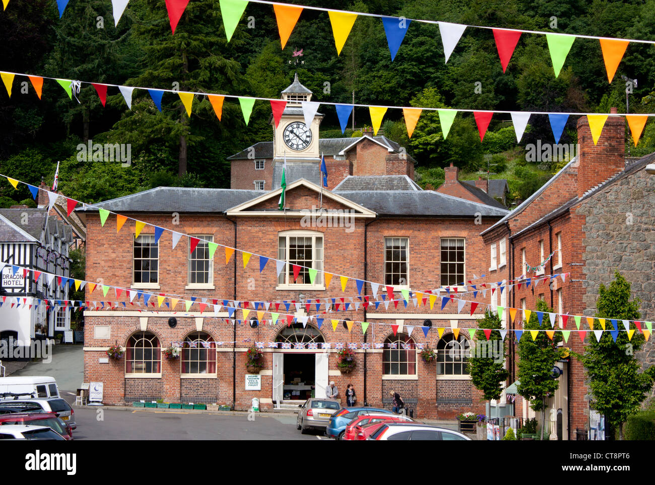 Montgomery Town Hall and clock tower and Broad Street with bunting Montgomery Powys Mid Wales UK Stock Photo