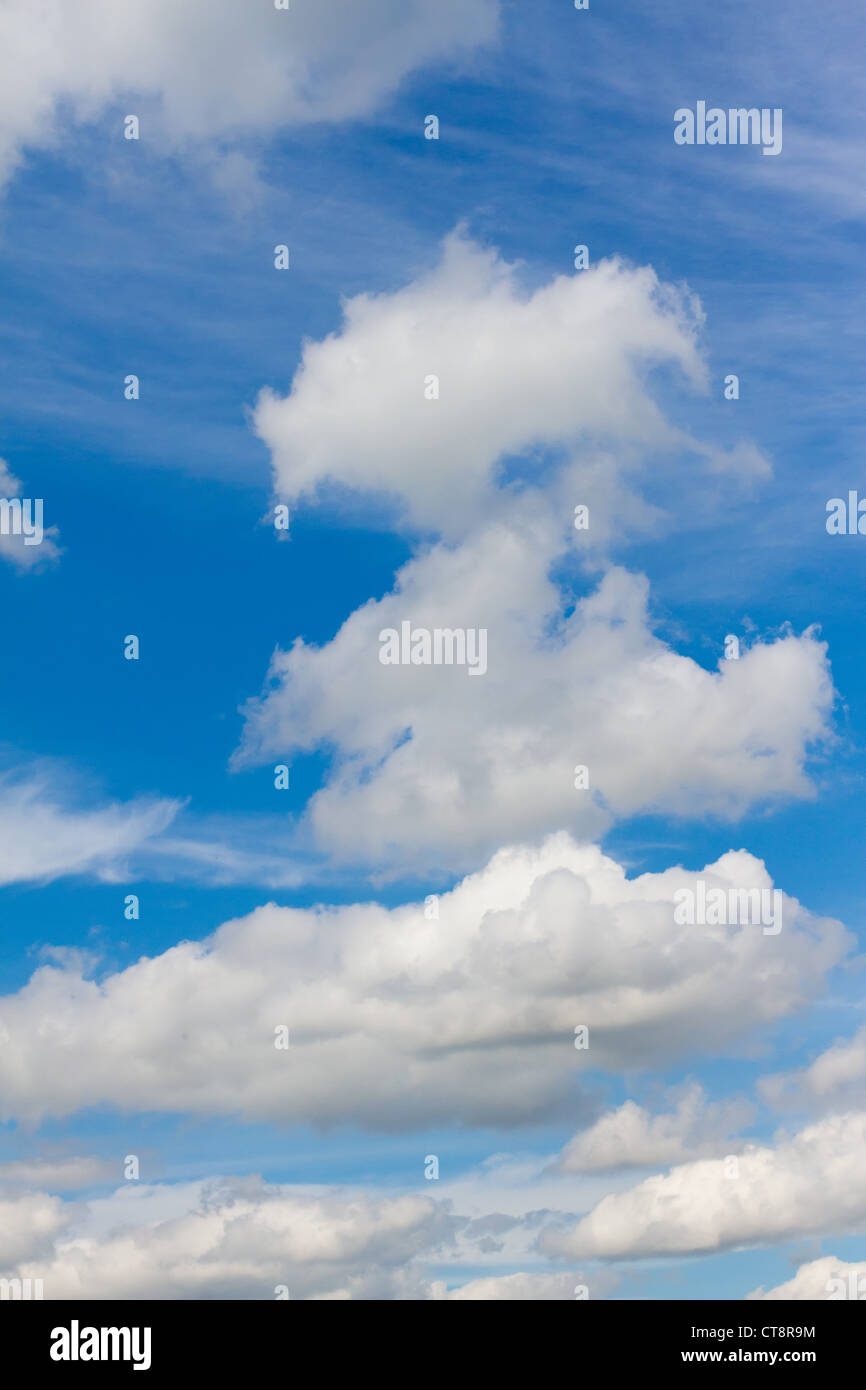 white wispy clouds in a vibrant blue sky Stock Photo - Alamy