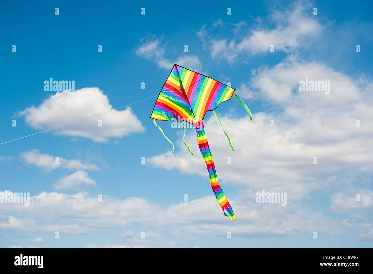 The colorful kite on the blue sky Stock Photo - Alamy