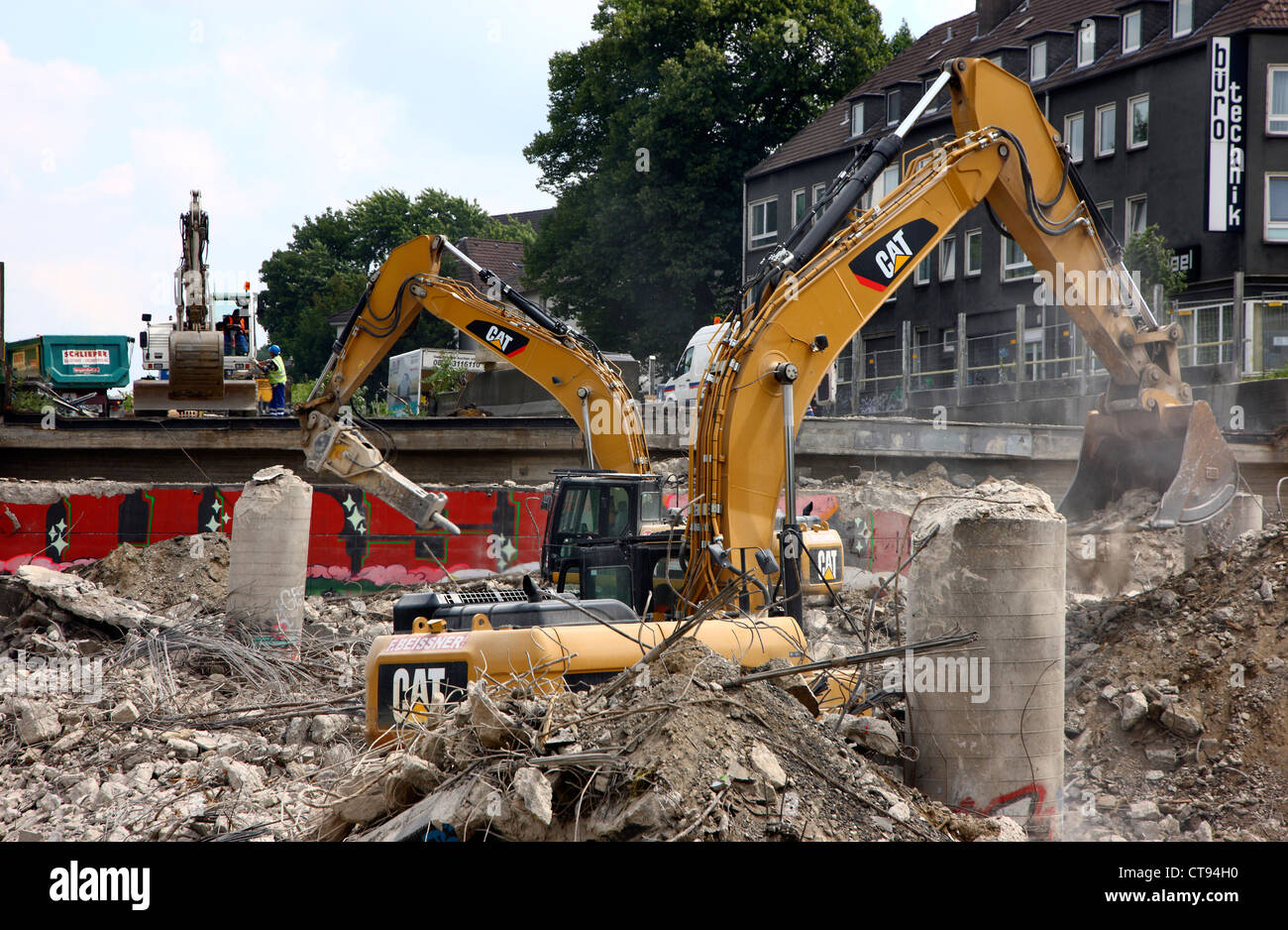 Demolition of a highway bridge over a rail track. Rebuilding of the
