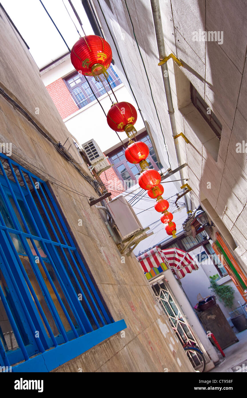 Chinese lanterns hanging in an alley of Shanghai - Tianzifang, Taikang Lu, Shanghai  - China Stock Photo