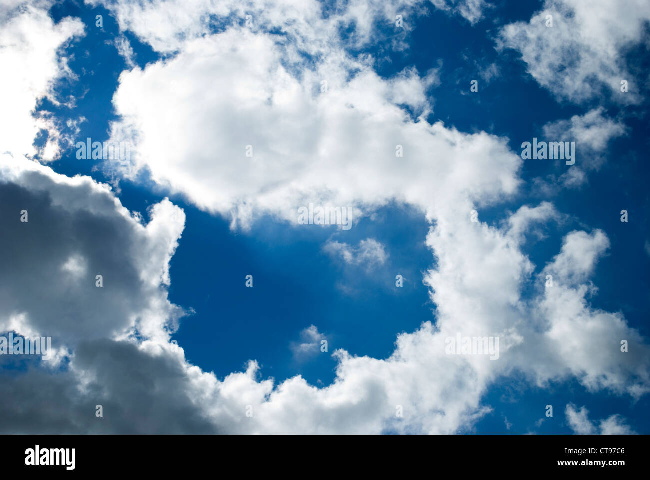 Stratus clouds drifting across the sky on a bright day Stock Photo Alamy