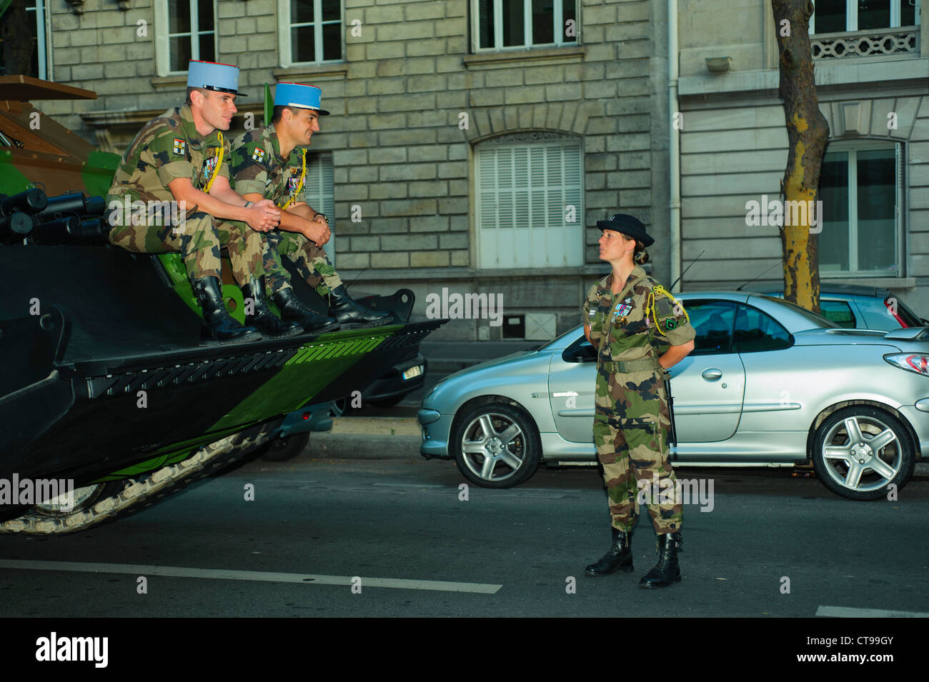 Paris, France, Public Events, 'Bastille Day' Celebration '14th of July' Military Parade, on the Champs-Elysees. French Army Man Talking to Army Woman on Tank, before Parade. Stock Photo