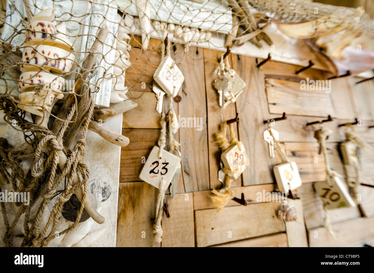 Room keys and driftwood artwork at l'Eco del Mare hotel partowned by