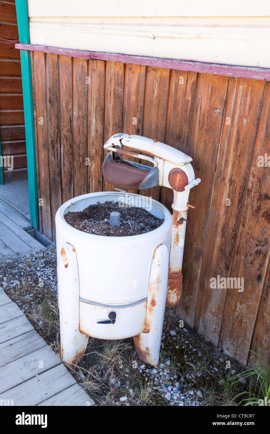 Antique wringer washing machine in Dawson City, Yukon Territory, Canada. Stock Photo