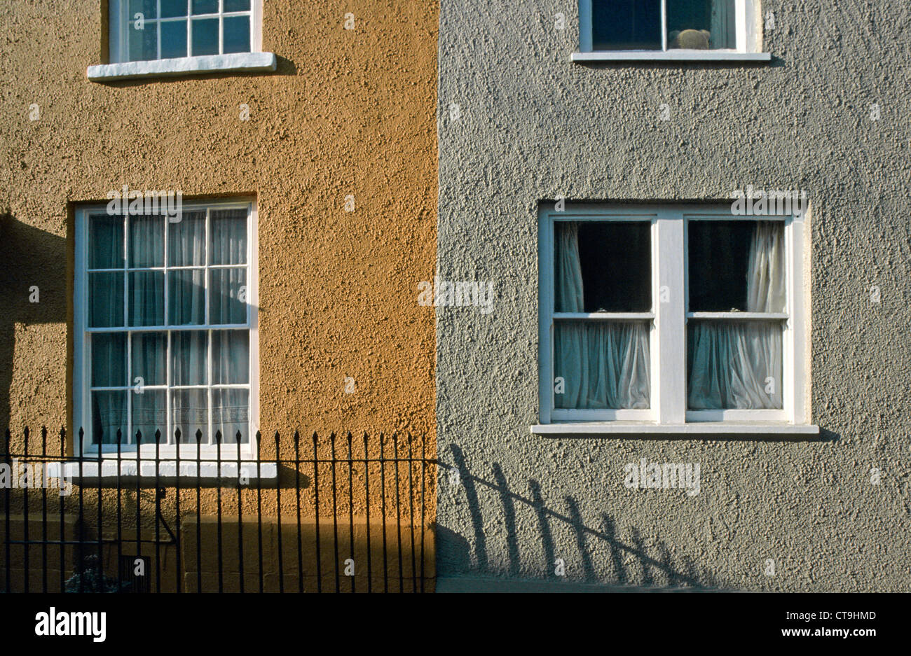 Terrace house windows, Malmesbury, Wiltshire, UK. Stock Photo