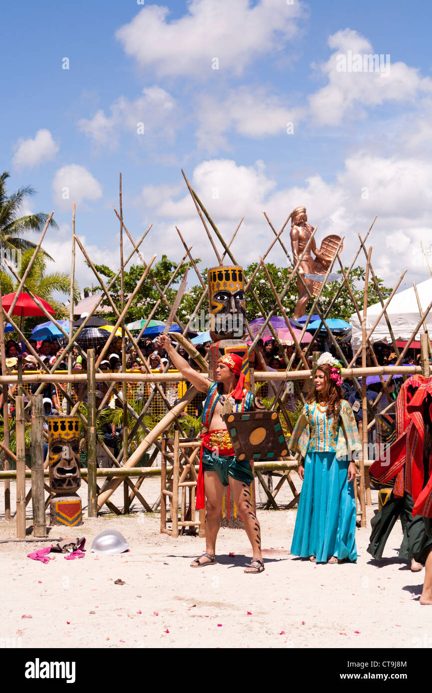 Chieftain Lapu-Lapu celebrates victory and the death of Magellan at the Battle of Mactan reenactment. Lapu-Lapu City Philippines Stock Photo