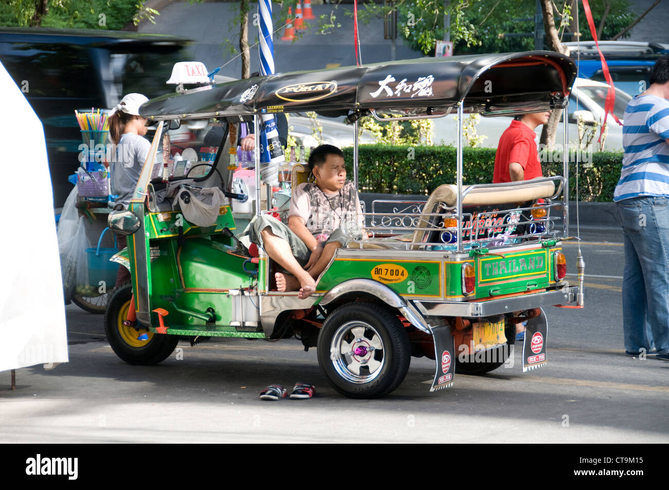 Tutul Driver A tut-tut driver waiting for costumers in Bangkok, Thailand Stock Photo ...