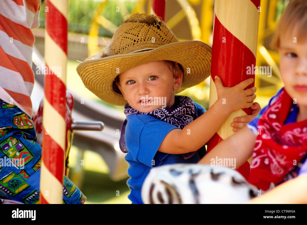 Large cowboy hat on child hi-res stock photography and images - Alamy