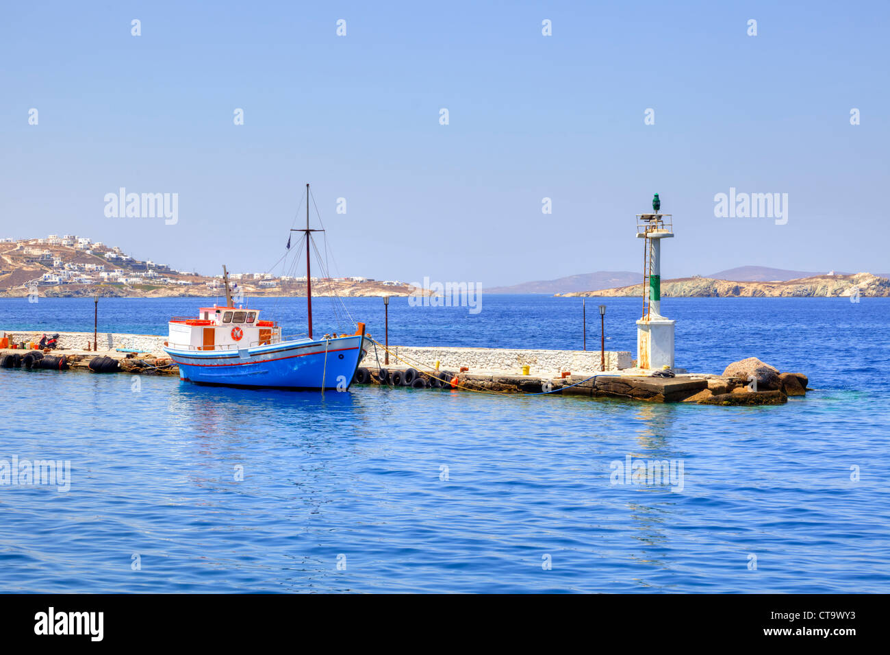 Breakwater of the fishing harbor in Mykonos, Greece Stock Photo