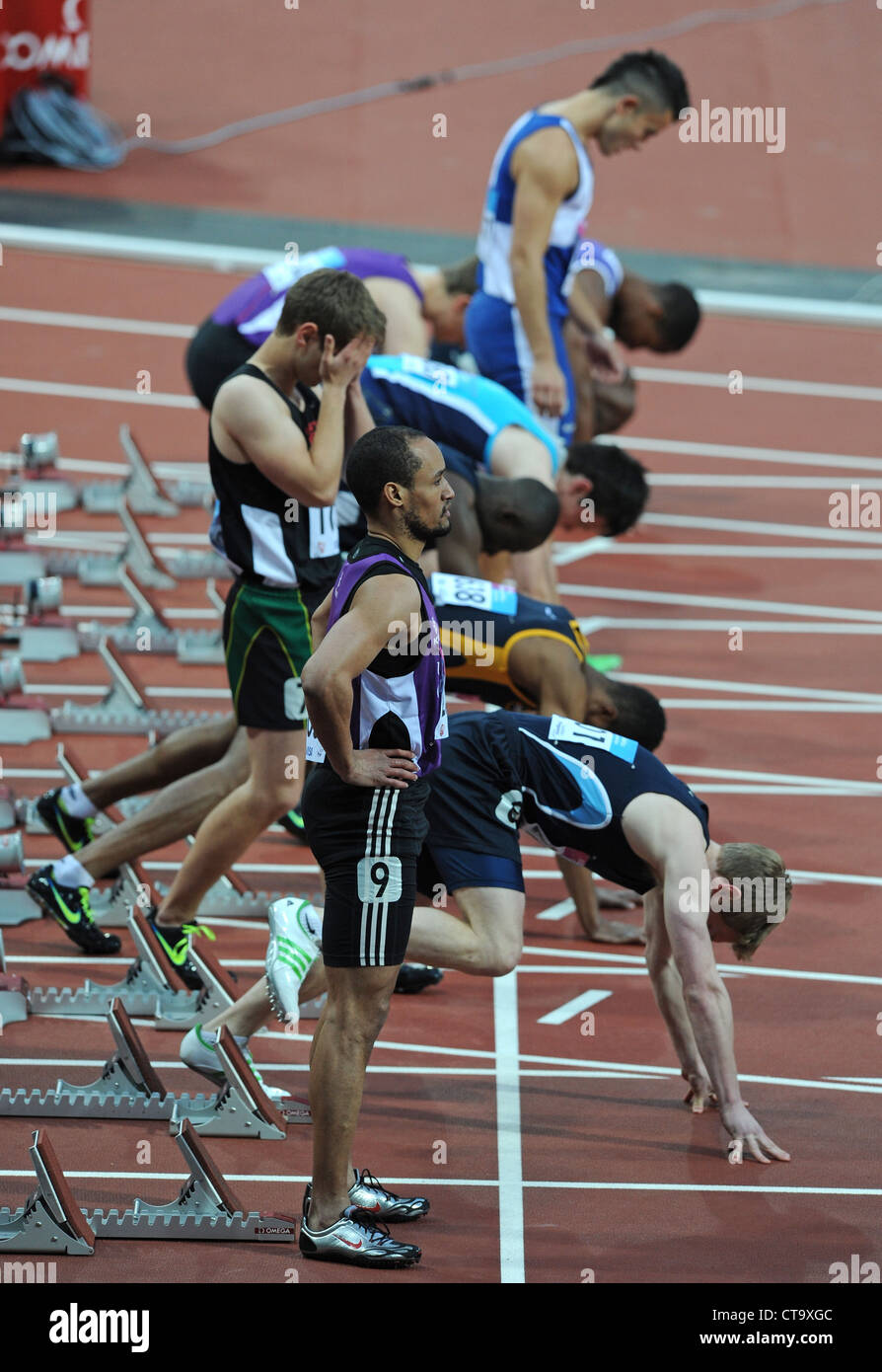 Sprinters in the starting blocks on a running track Stock Photo Alamy