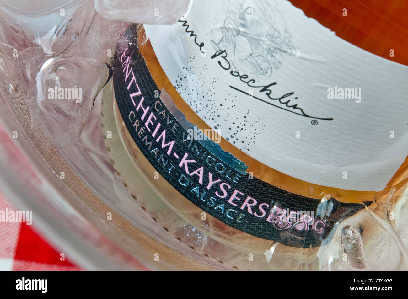 Close view on Anne Boecklin  'Cremant d'Alsace ' sparkling rose wine bottle label in ice cooler Stock Photo