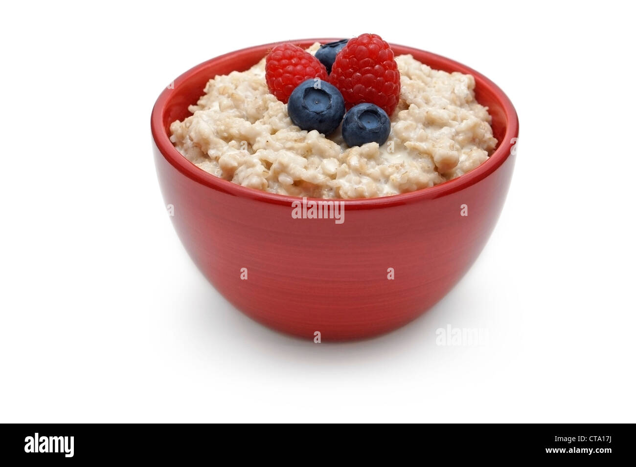 Oatmeal, Bowl of Oatmeal Porridge with Berries Stock Photo