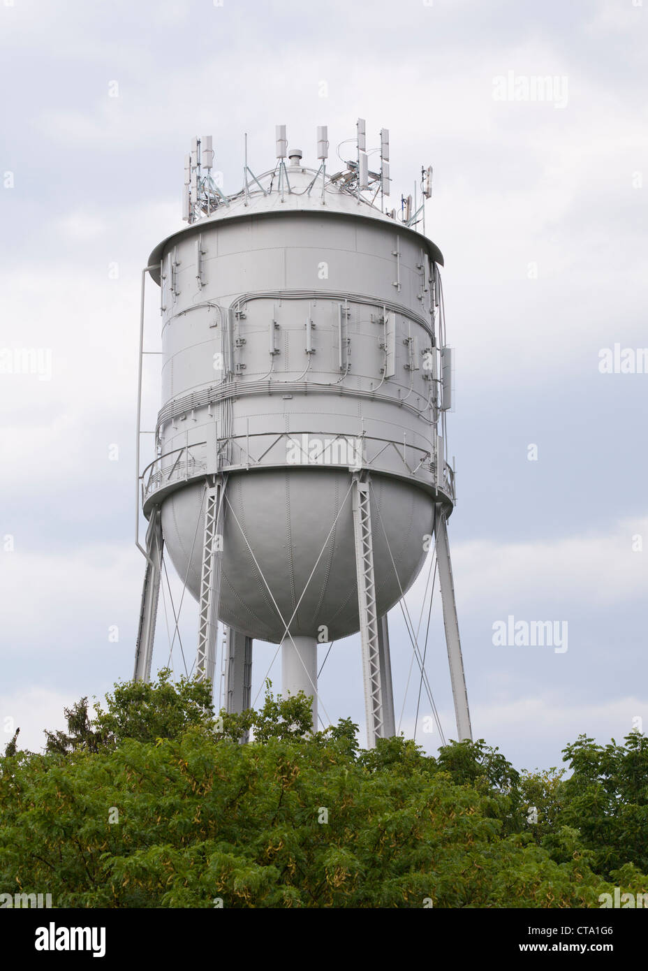 A rural water tower mounted with cellular antennas Stock Photo Alamy