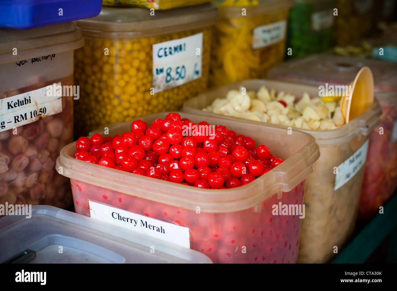 Malaysia, Penang, Georgetown Preserved red cherries for sale in Penang. Photo Kees Metselaar Stock Photo