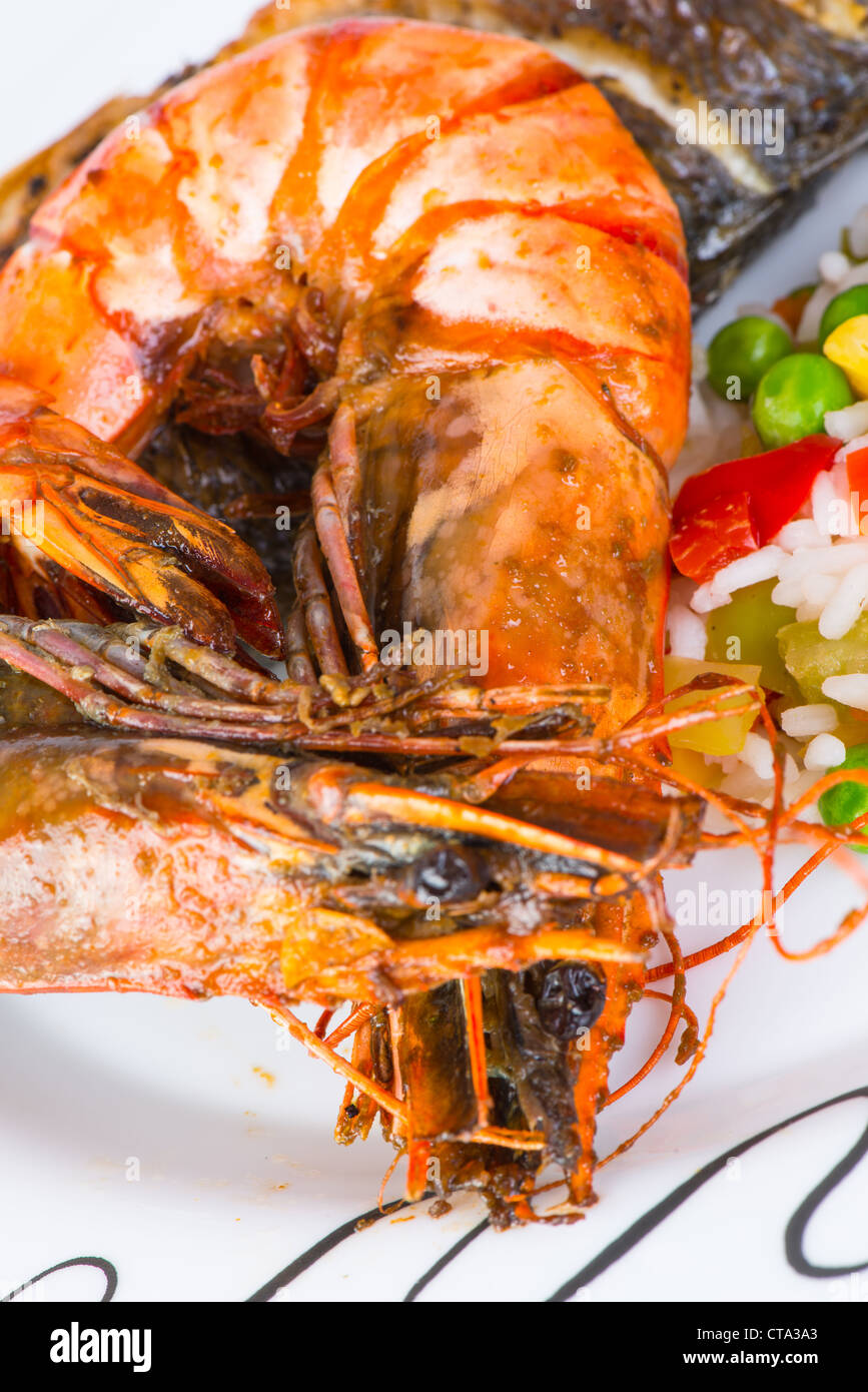 Giant prawns with sea bass fish Stock Photo - Alamy