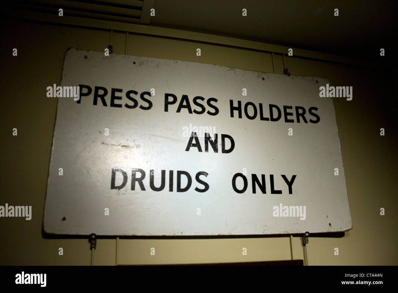 Notice/Sign posted in times passed for press pass holders and druids only used at Stonehenge by the local council and police Stock Photo