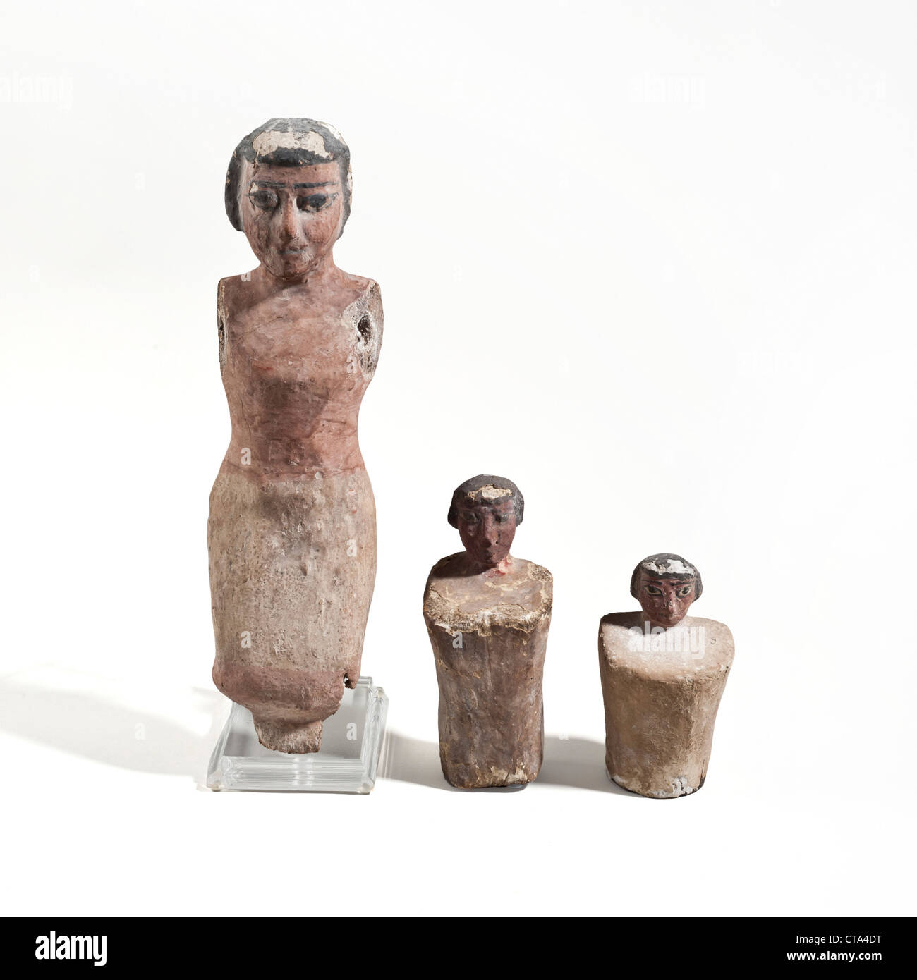 Three Egyptian wooden figurines 1st millennium BCE Stock Photo