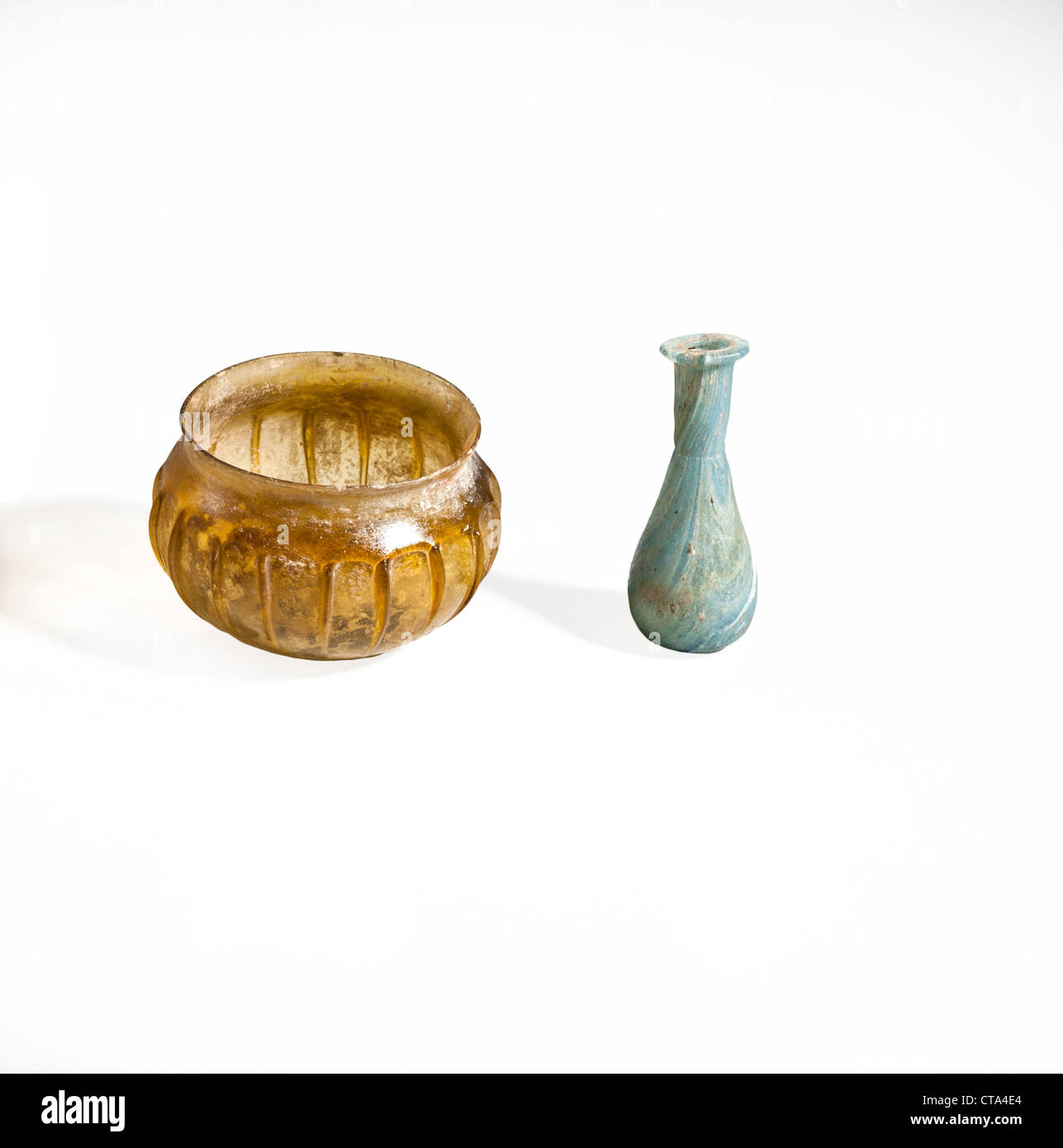 2 Roman glass containers one yellow one green first centuryBCE Stock Photo