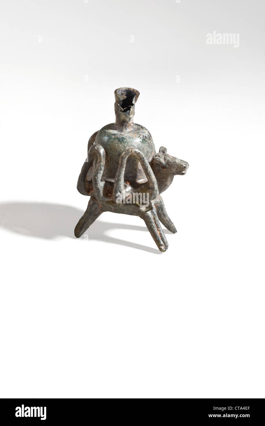 Islamic Zoomorphic glass flask. Donkey carrying a bottle 7-8th century CE Stock Photo