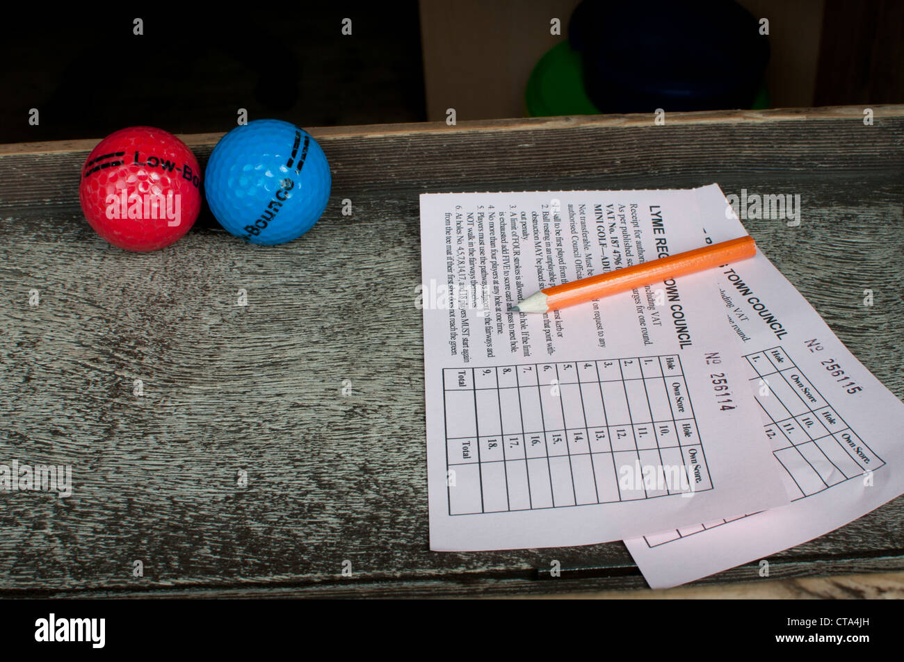 mini golf balls and score sheet Stock Photo Alamy