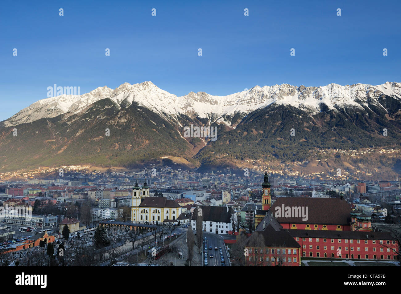 Innsbruck with snow covered Northern range of Karwendel in the background, Innsbruck, Tyrol, Austria, Europe Stock Photo