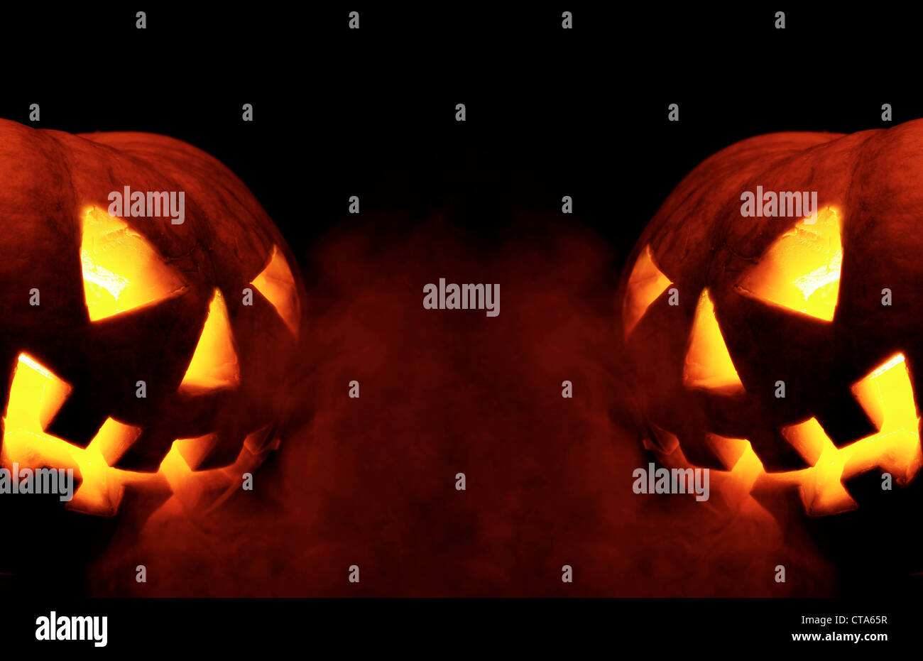 A scary old jack-o-lantern on black Stock Photo - Alamy