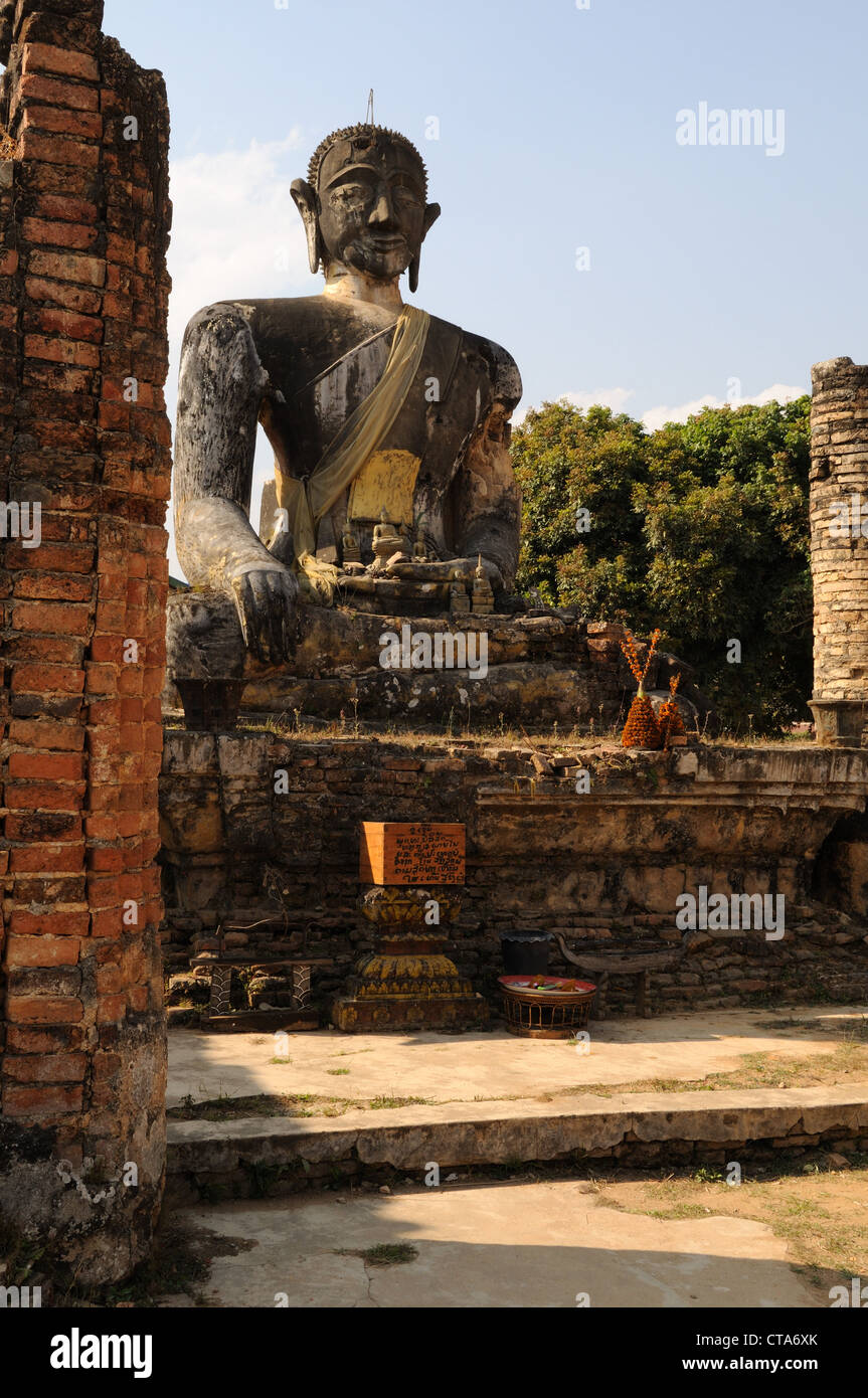 Statue of Buddha at Wat Phia Buddhist Temple at the Ruined City of  Xieng Khuang Phonsavan  Laos Stock Photo