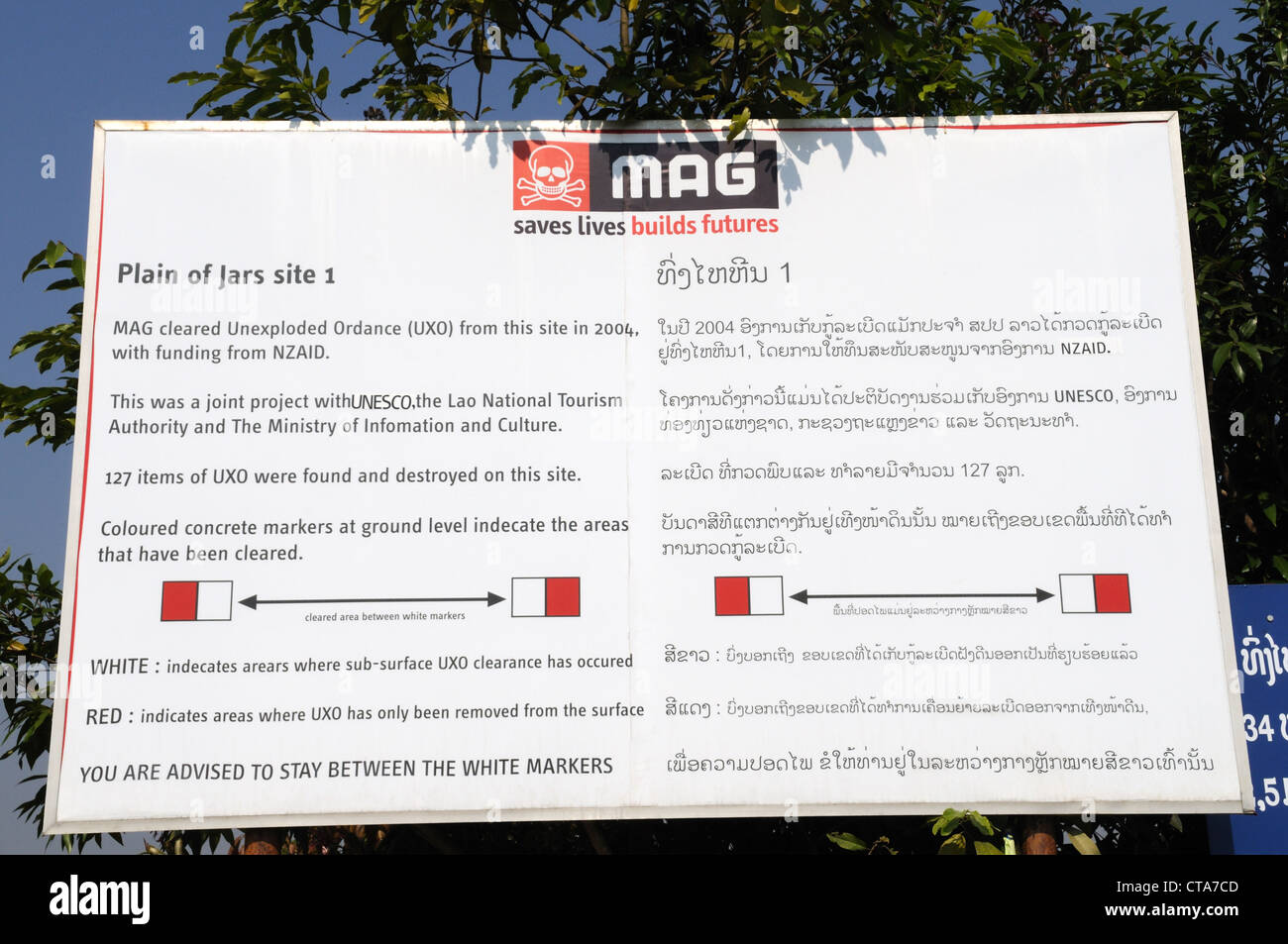 MAG safety sign for the Plain Of jars site  1 Annamese Cordillera Xieng Khuang Province Northern Laos Stock Photo