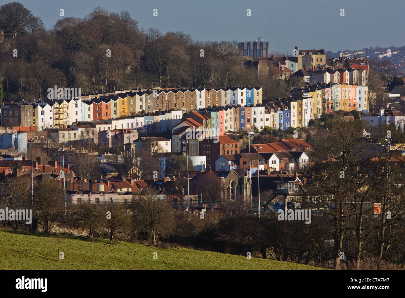 Rows of colourful hillside housing in winter in Bristol UK Stock Photo