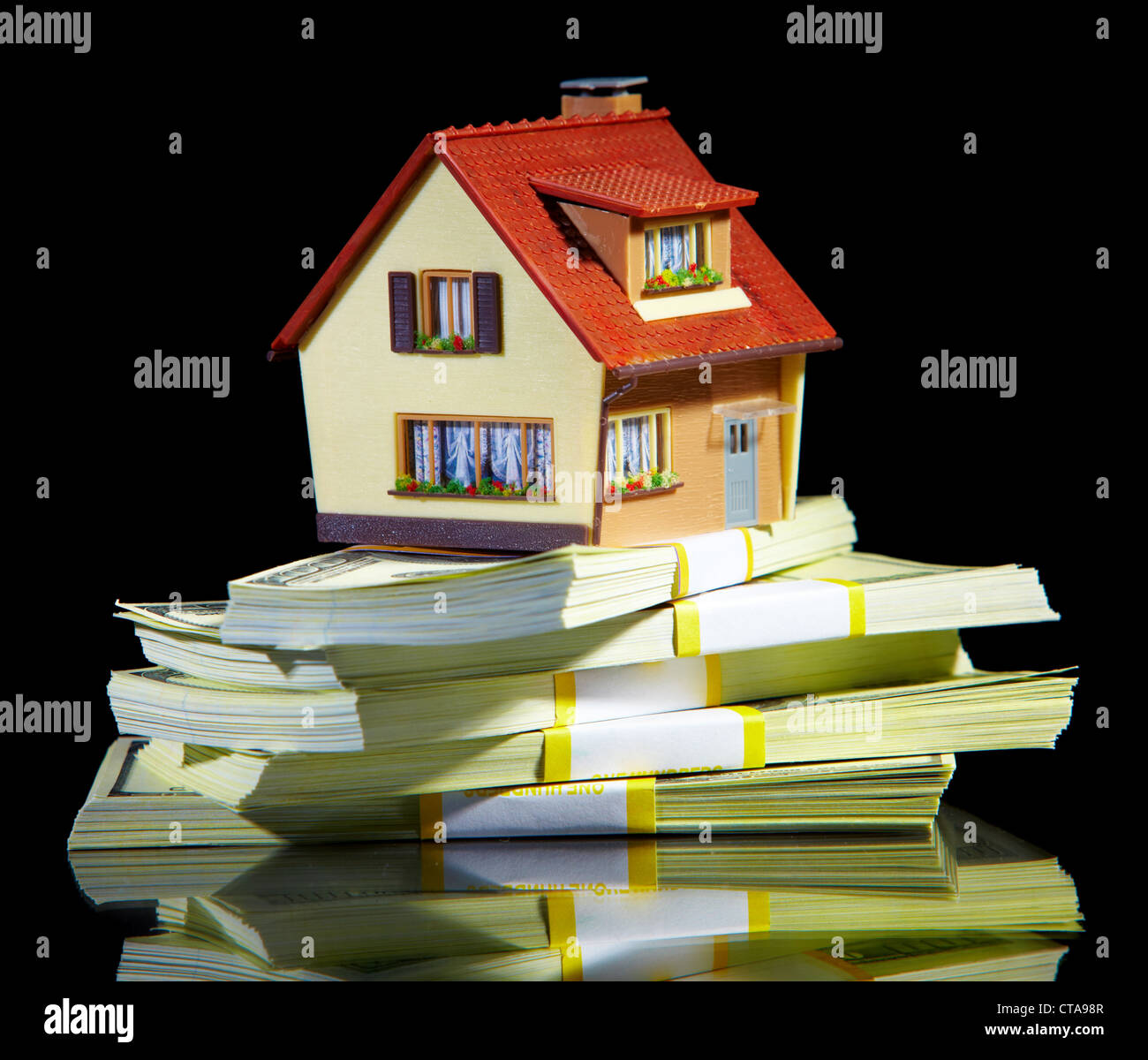 house on packs of banknotes Stock Photo - Alamy
