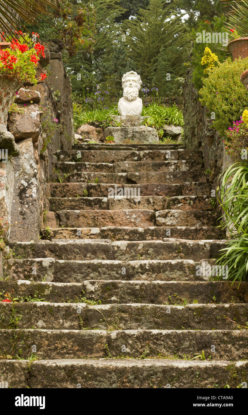 Tresco Abbey Gardens Neptune's steps leading to the ship figurehead of the S.S. Thames. Stock Photo