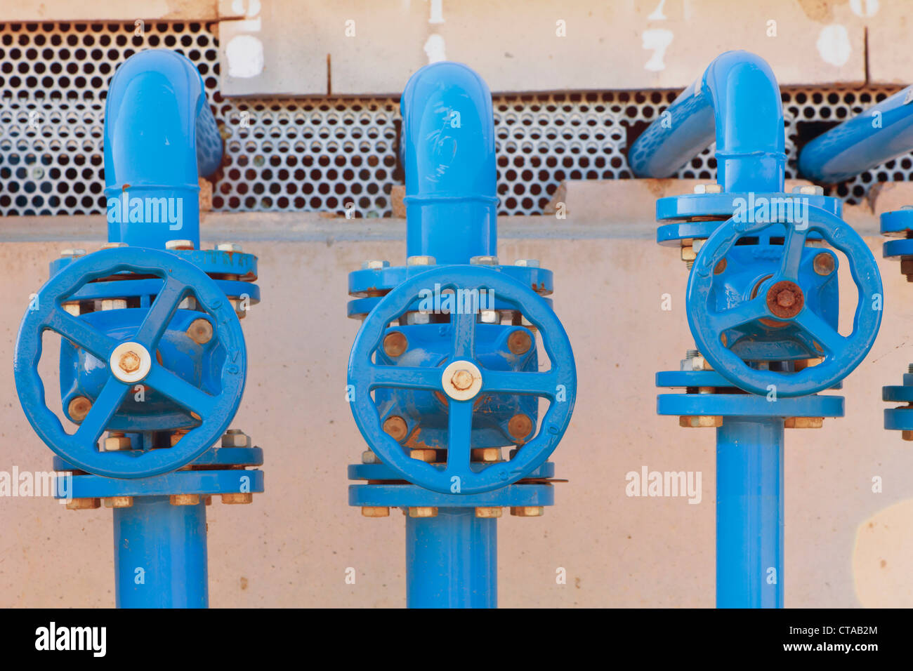 Valves used to control water and chemical flow in hot houses, Huelva Province, Andalusia, southern Spain. Stock Photo