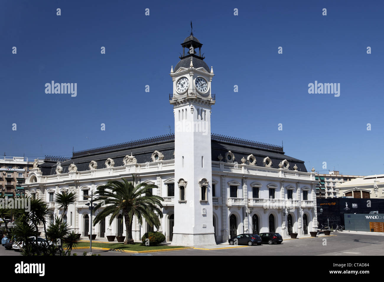 Clock tower building at harbour in the sunlight, Valencia, Spain