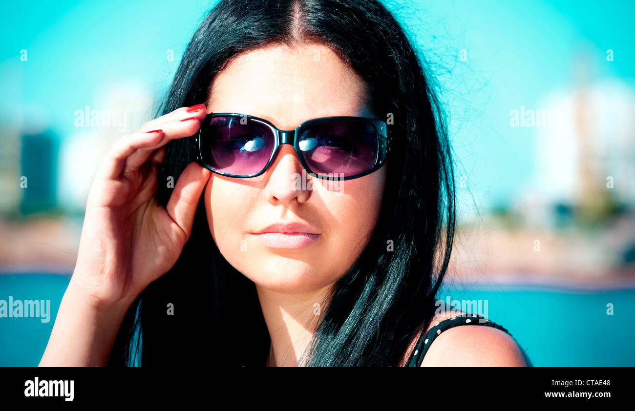 Portrait of the girl wearing sunglasses Stock Photo - Alamy