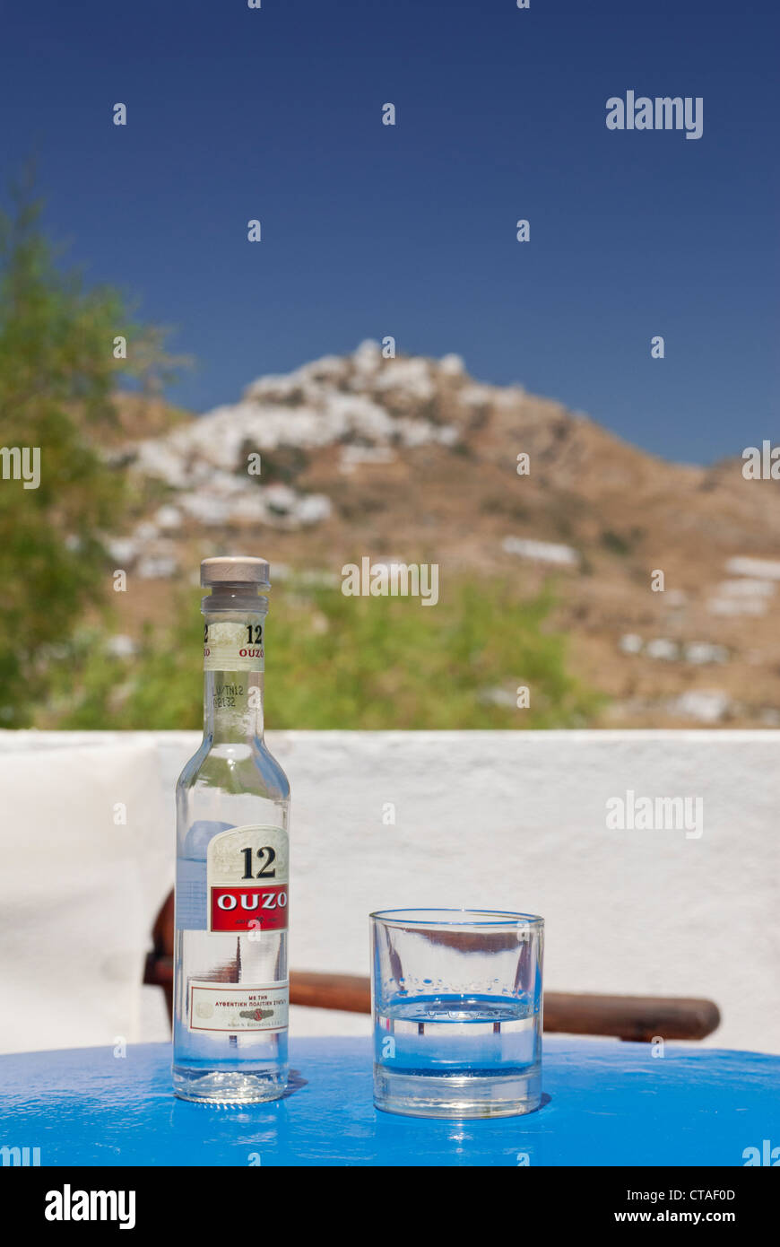 Bottle of Ouzo and glass, Serifos Island, Cyclades, Greece Stock Photo