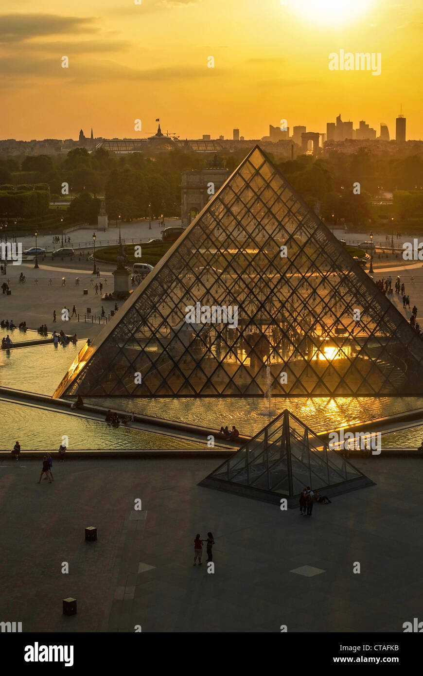 The louvre pyramid in Paris Stock Photo