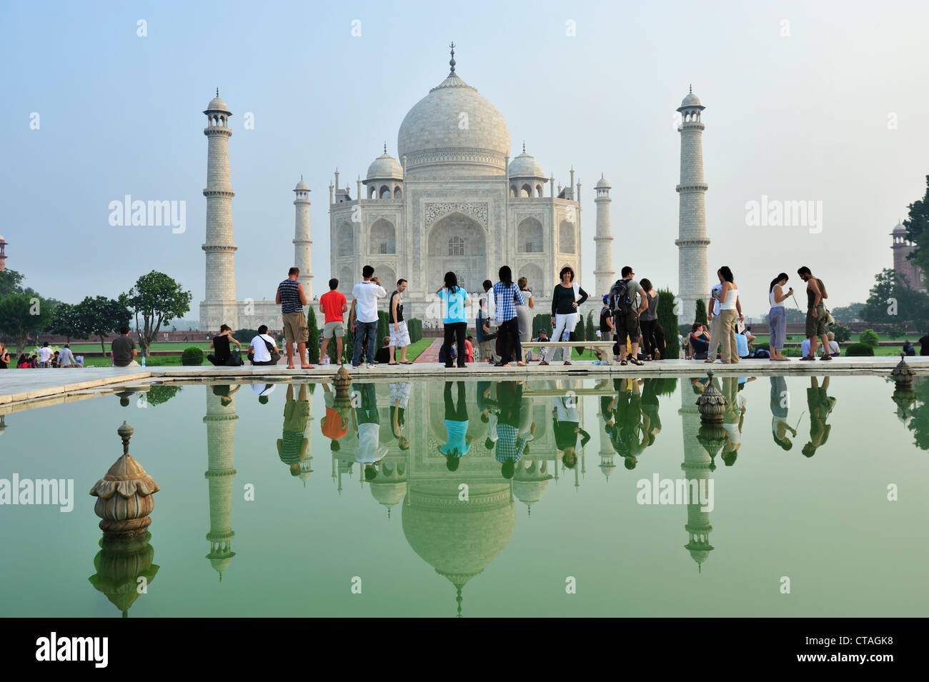 Taj Mahal and tourists reflecting in pond, Taj Mahal, UNESCO World ...