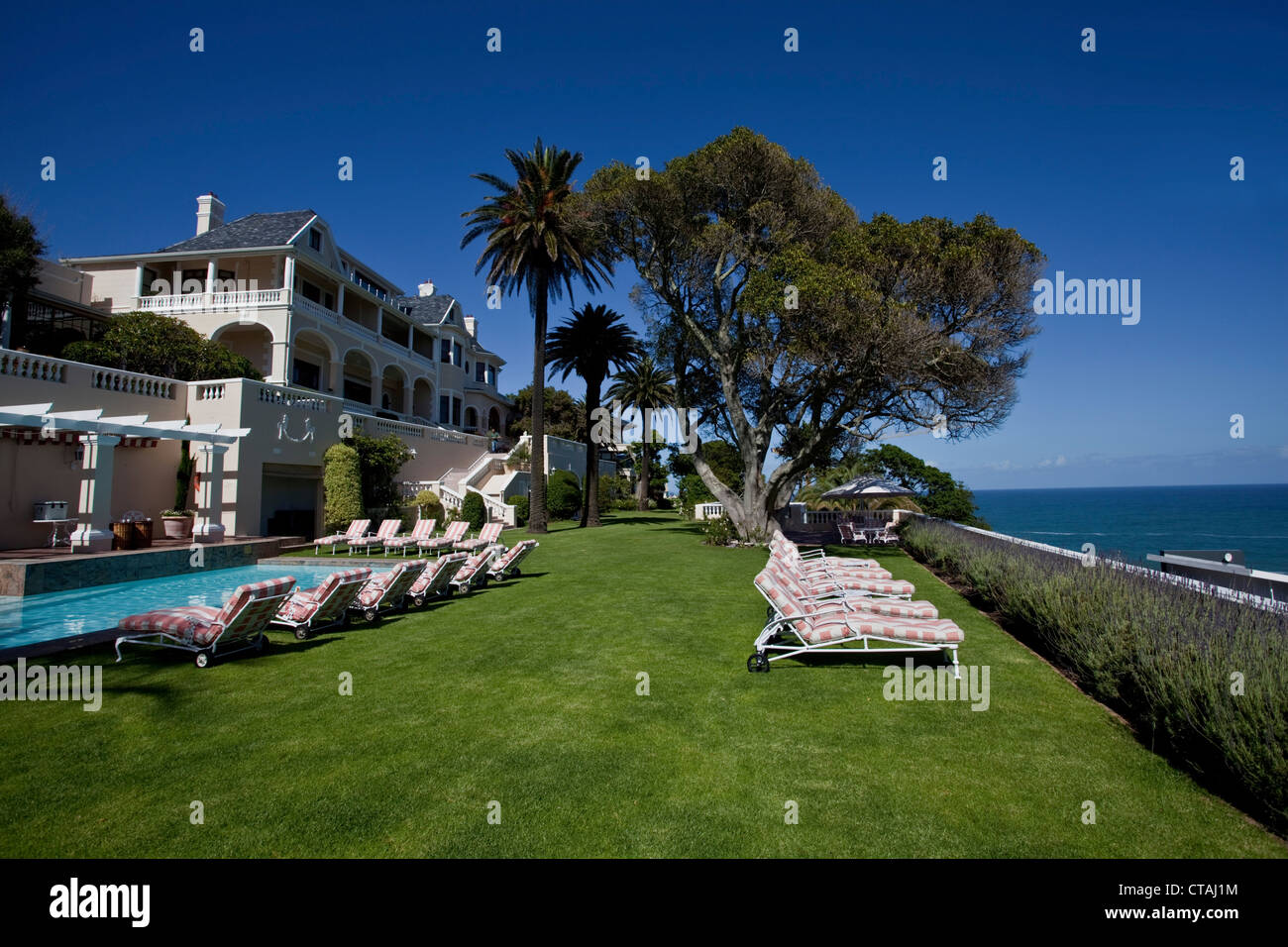 Garden terrace at the swimming pool of the Hotel Ellerman House, Bantry Bay, Cape Town, Western Cape, South Africa Stock Photo