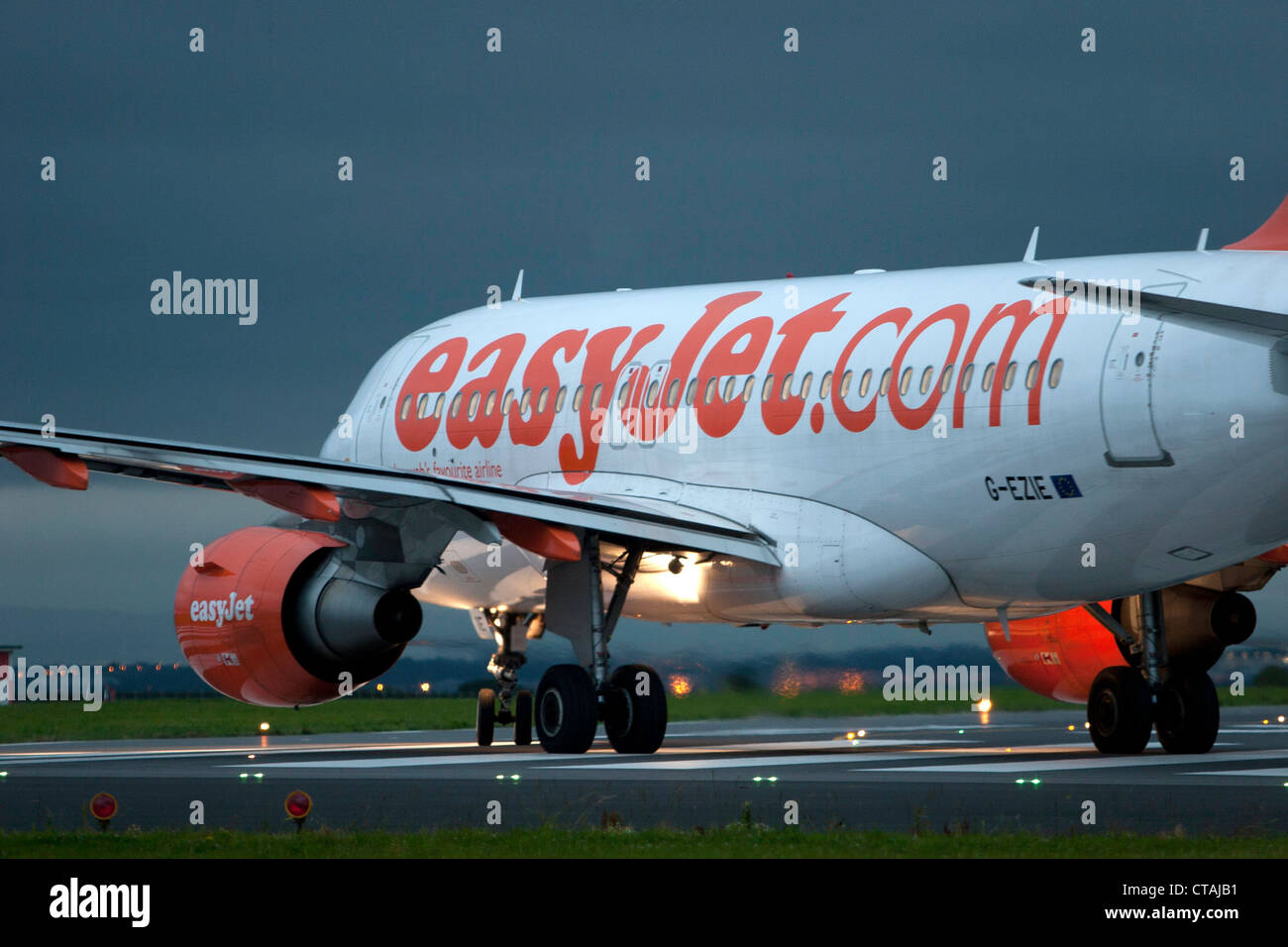 EasyJet A319-111 G-EZIE lines up on runway 27 on an early flight from John Lennon Airport. Pic Colin Paxton/CP Photography Stock Photo