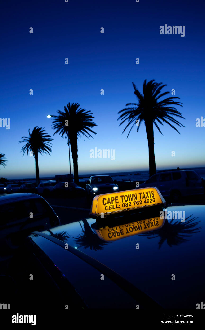 Sun-set impression on Victoria Road at Camps Bay, Cape Town, Western Cape, South Africa, RSA, Africa Stock Photo