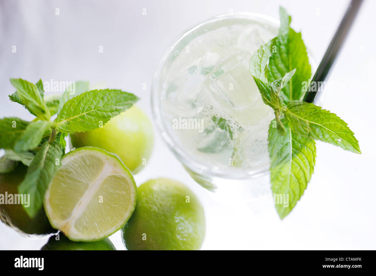 Caipirinha with limes and mint leaves, Cocktail, Alcoholic Drink Stock Photo