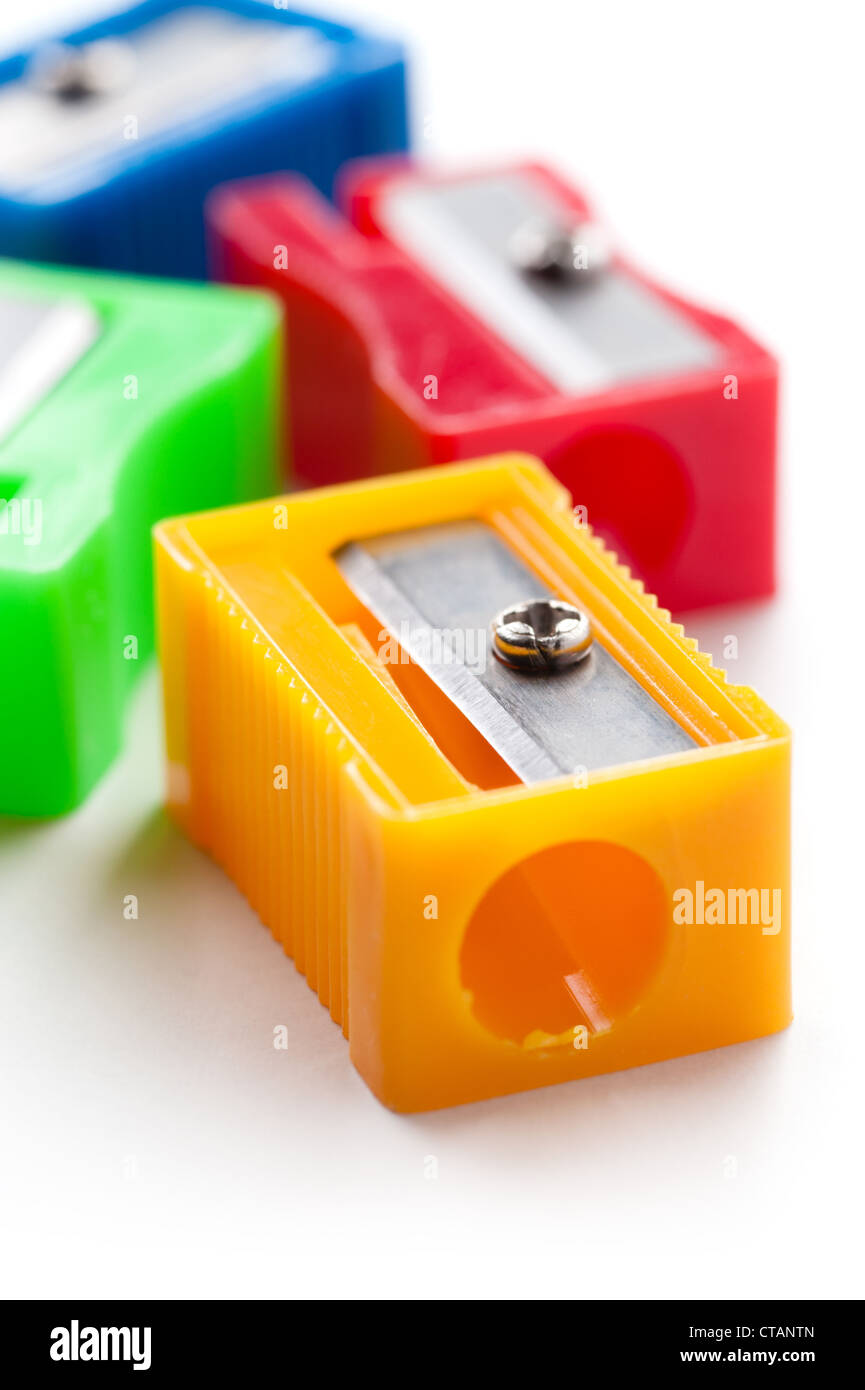 Group of multicolor pencil sharpeners, closeup shot, isolated on white