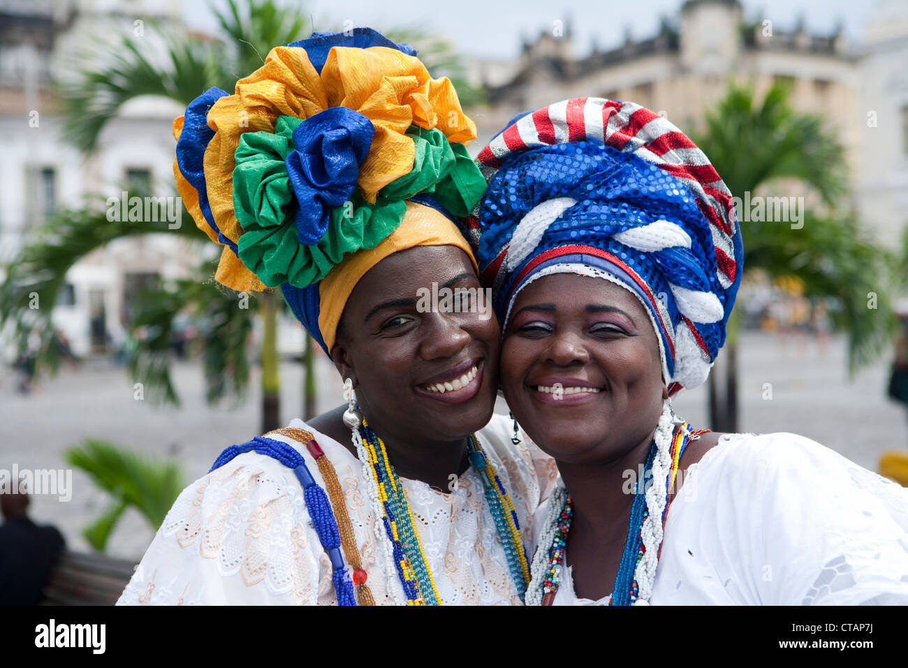 Two friendly Brazilian women in traditional costume, Salvador, Bahia, Brazil, South America Stock Photo