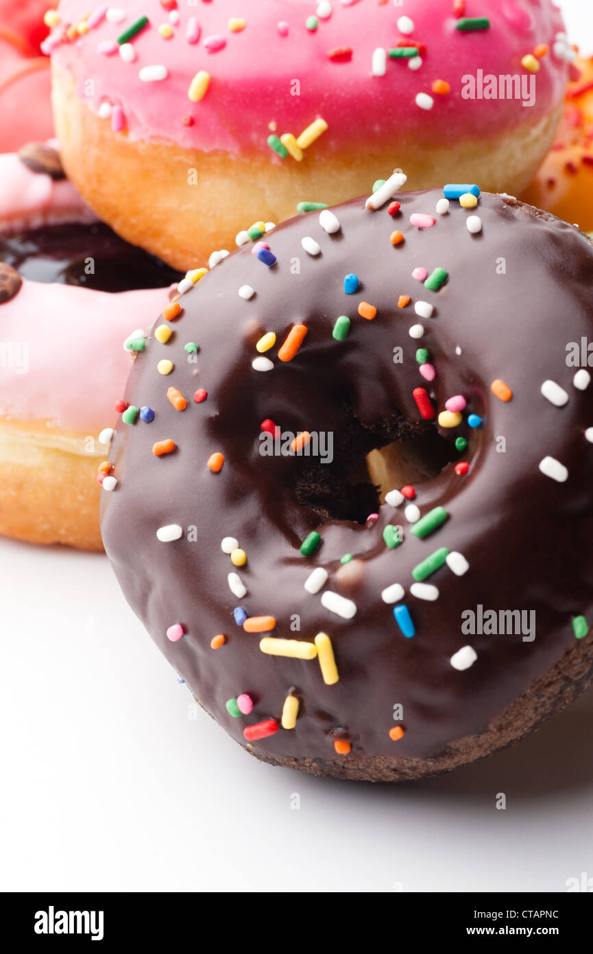 Group of glazed donuts, isolated on white background Stock Photo - Alamy