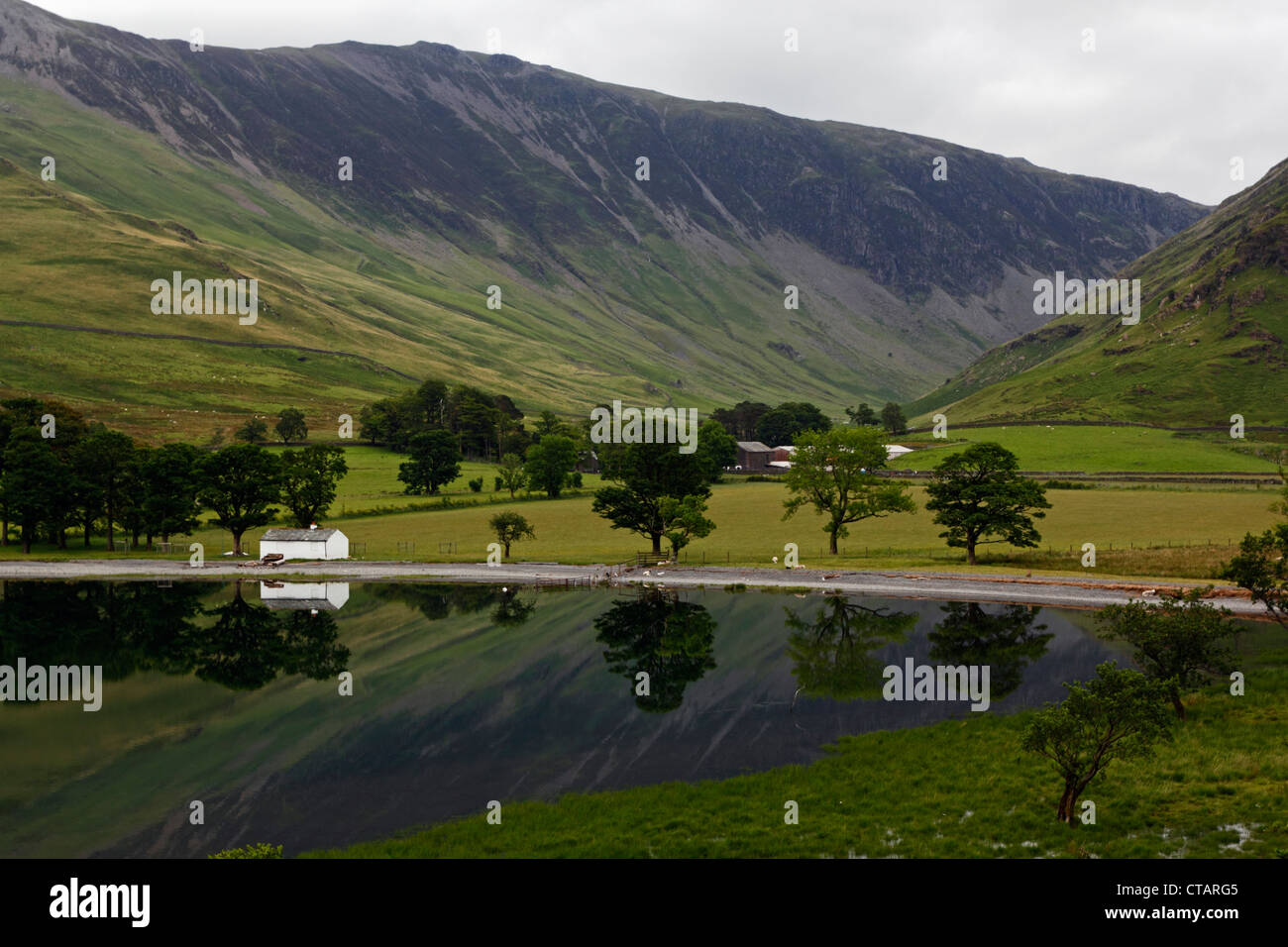 Little house on the edge of Buttermere in the Lake District National Park, Cumbria. Stock Photo