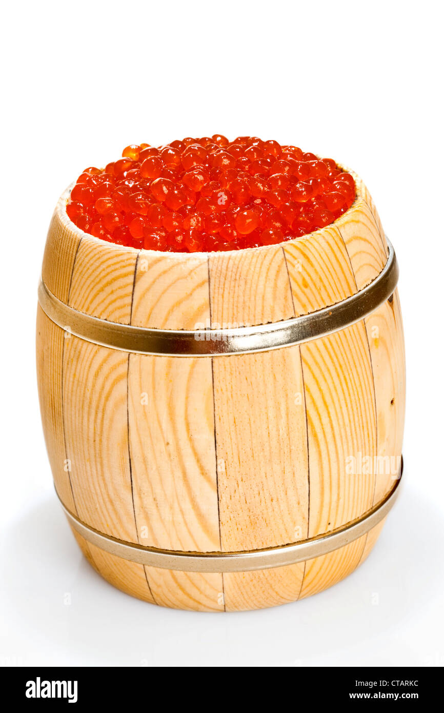 Russian red caviar in small barrel on the white Stock Photo